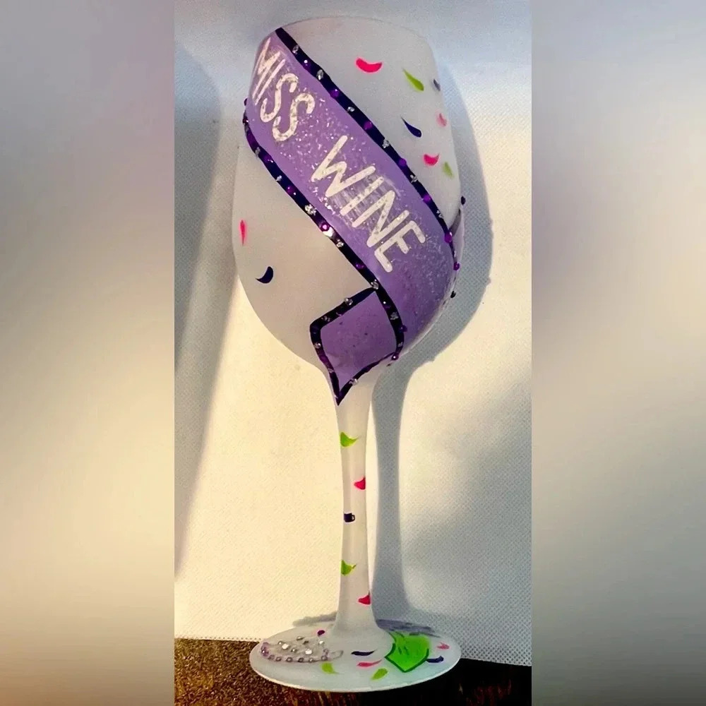 Lolita | “Miss Wine”, wine glass.